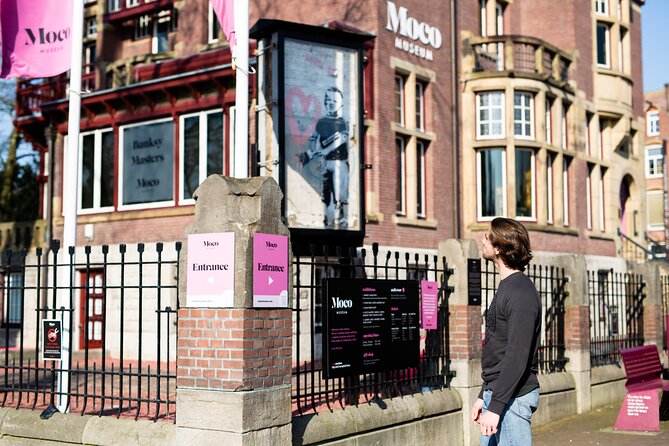 Amstagram Tour & Moco Experience - Spui square and Bloemenmarkt: end with two landmarks that photograph well
