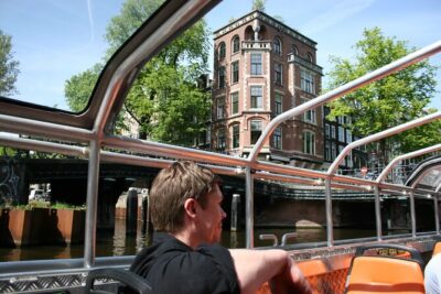 Amsterdam 1h Canal Cruise by Semi-Open Boat with Audio Guide - Unobstructed Canal Belt Views: What You See From the Water