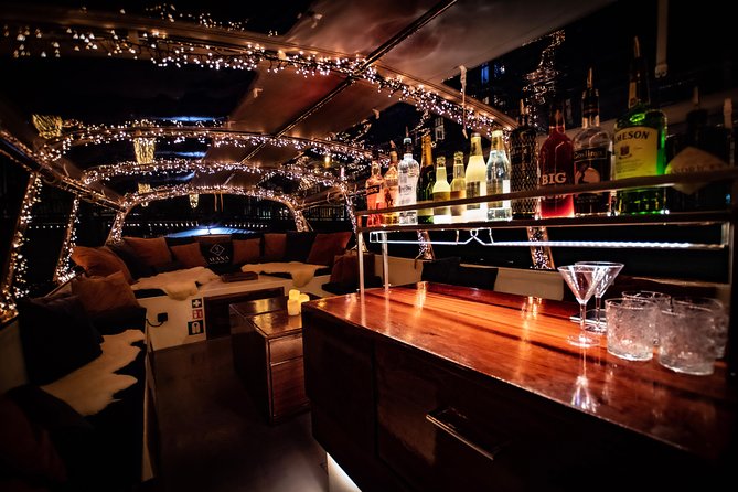 Amsterdam 2-Hour Evening Cruise With Live Guide and Bar - Amstel River and Amstel beer: how trade became a modern tradition