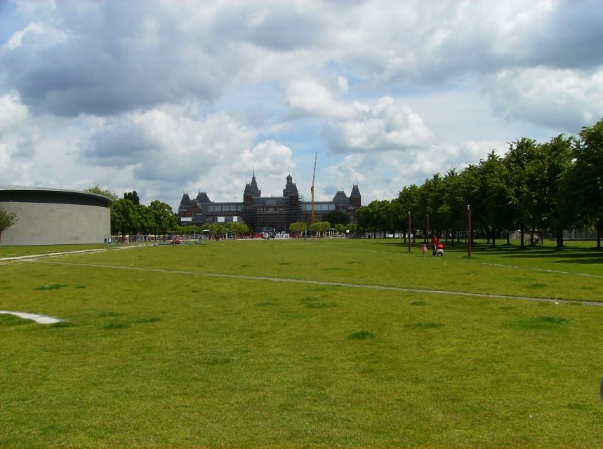 Amsterdam: 2-Hour Sightseeing Tour by Rickshaw - Canal Views and Photo Stops: The Amsterdam Factor