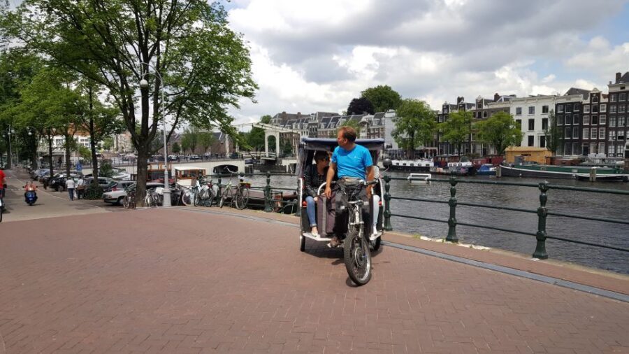 Amsterdam: 2-Hour Sightseeing Tour by Rickshaw - Walking Breaks: Where the Rickshaw Stops and You Go On Foot