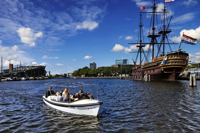 Amsterdam: 60-Minute Guided Private Canal Cruise with Drinks - Private boat, relaxed pace, and real chances to talk