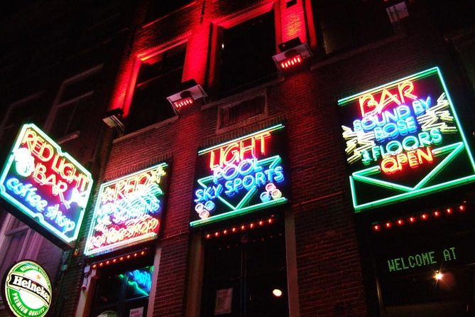 Amsterdam After Dark: Public Red Light District Exploration - De Waag: the oldest stock market stop and the torture chamber story