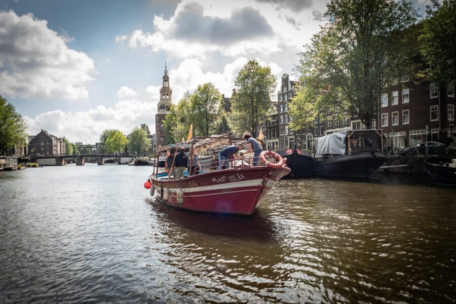 Amsterdam: Canal Cruise on a Wooden Refugee Boat - The migration story you hear on the water, not in a classroom