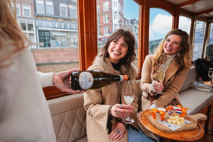 Amsterdam: Canal Cruise with Bubbles & Bites - Route Highlights: Skinny Bridge, Jordaan, and the Red Light District