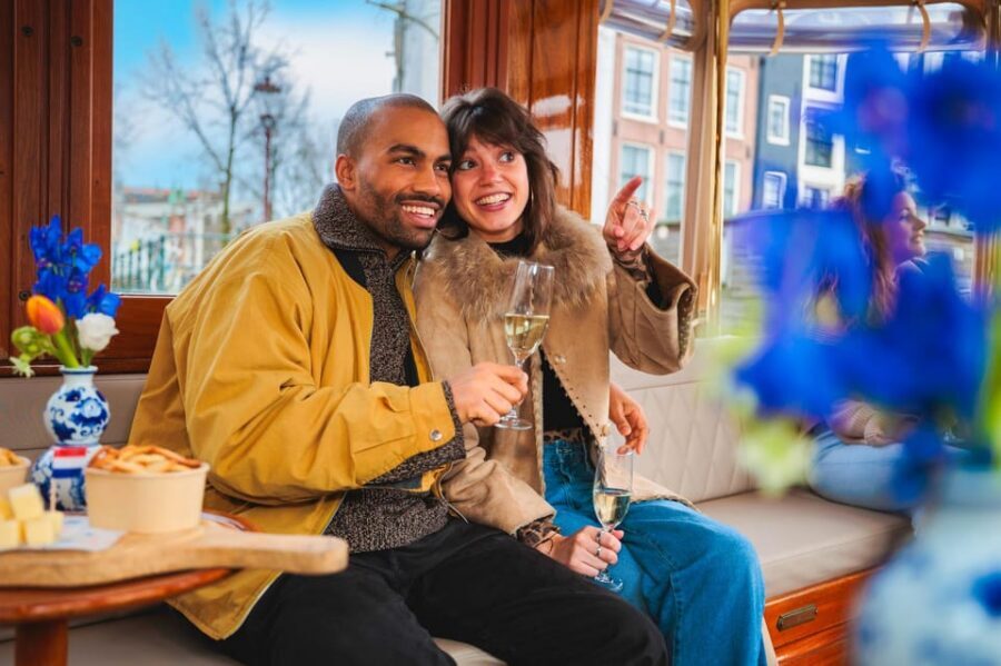 Amsterdam: Canal Cruise with Bubbles & Bites - Best Time to Go and What to Wear for the One-Hour Ride