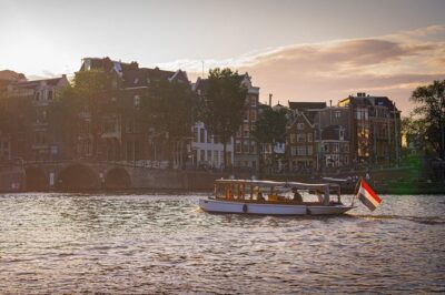 Amsterdam Champagne Private Canal Cruise - What You’ll See: Magere Brug and Canal Moments From the Water