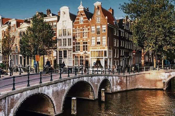Amsterdam City Center & History - Exclusive Guided Walking Tour - Zeedijk and Nieuwmarkt: old sea defenses and the city’s shopping heart