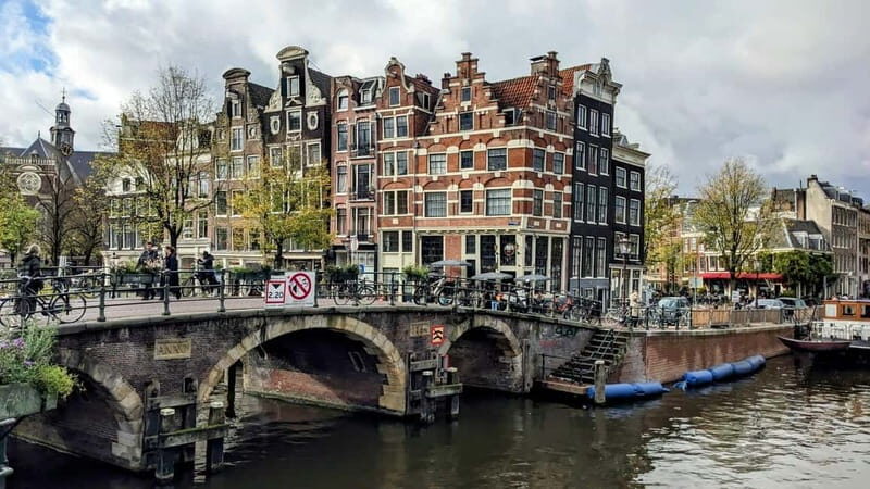 Amsterdam: City walking experience with a local - Dam Square and Spui Square: The City’s Public Rooms