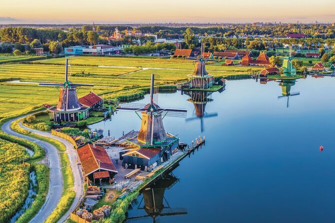 Amsterdam: Day Trip to Keukenhof & Zaanse Schans Windmills - Returning to Amsterdam: flexible buses, self-managed timing