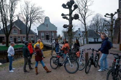 Amsterdam E Bike Tour to the Windmills of Zaanse Schans - From Amsterdam Centraal to Amsterdam North: the fast shift from city to country