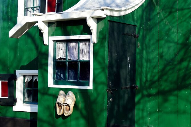 Amsterdam E Bike Tour to the Windmills of Zaanse Schans - Zaanse Schans: the heritage village where windmills, cheese, and clogs come together