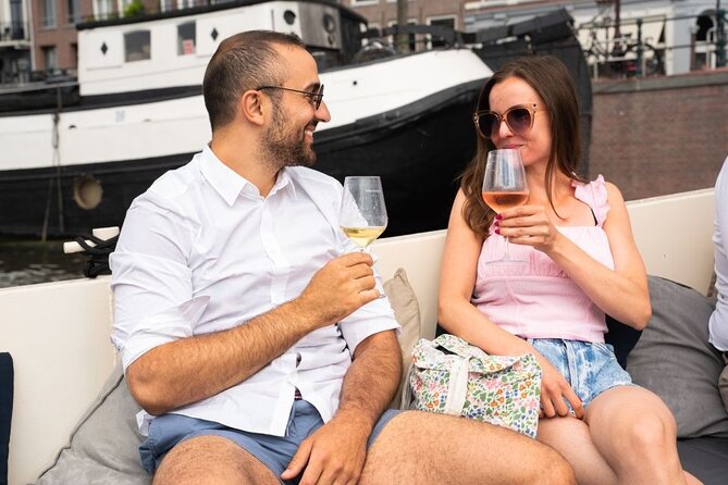 Amsterdam: Evening Candle Light Cruise With Wine & Cheese - Crew and storytelling: the real difference maker