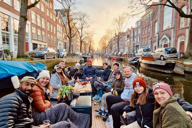 Amsterdam Evening Cruise in Small Group - UNESCO Canal Belt stops: Singel, Herengracht, Keizersgracht, Prinsengracht