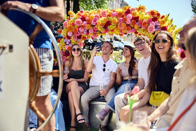 Amsterdam Flower Boat Canal Cruise with Local Guide - Drinks, weather, and timing: practical tips so your hour goes smoothly