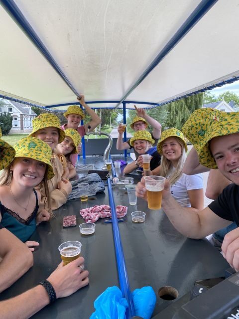 Amsterdam: Guided Beer or Prosecco Bike Tour - Seeing Amsterdam From Regulated Routes (Not Free Roaming)