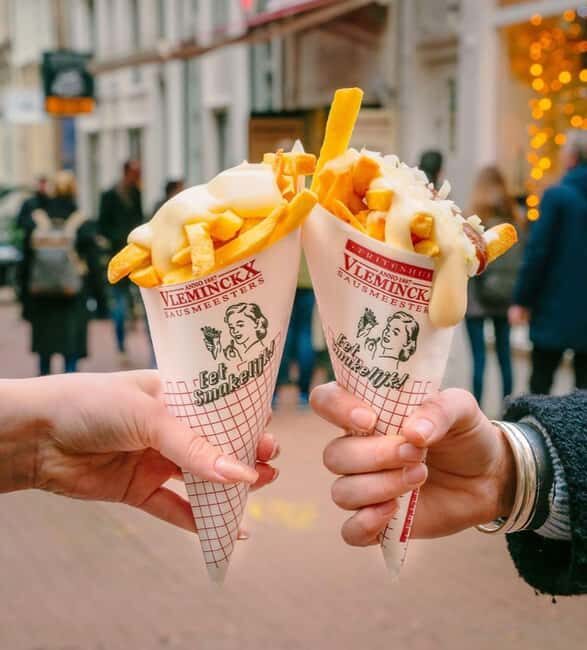 Amsterdam: Guided Cultural Food Tour in German or English - Stop 5: Magna Plaza (a short stop with a modern twist)