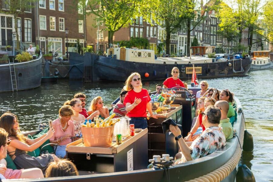 Amsterdam: Guided Open Boat Canal Cruise Including Drink - Practical tips to make your photos better and the ride smoother