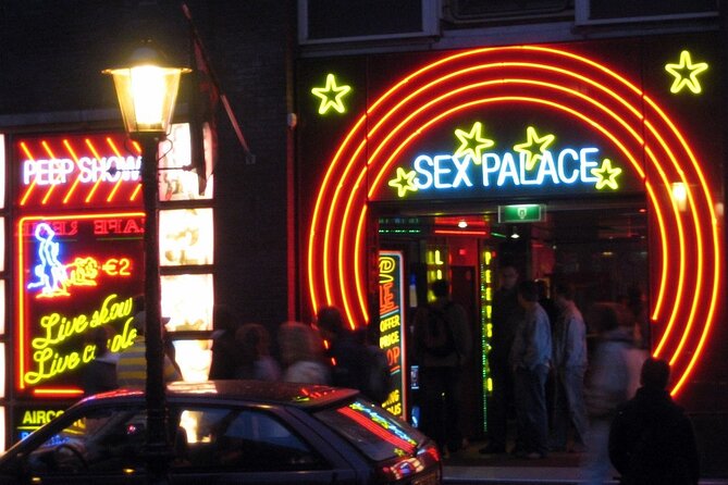 Amsterdam: Guided Red Light District and City Walking Tour - The Smallest House of Amsterdam and the VOC Storage Angle