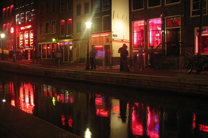 Amsterdam: Guided Red Light District and City Walking Tour - Condomerie Since 1987: A Modern Business in an Old Neighborhood