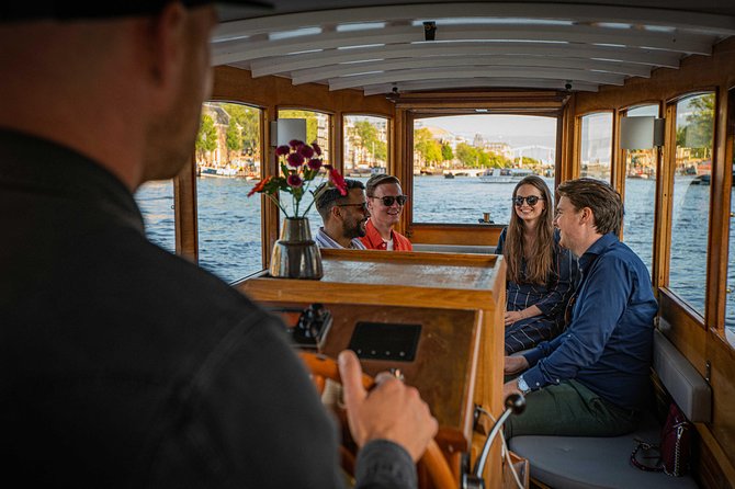 Amsterdam Highlights Canal Cruise with a Drink - Chilled wine on a UNESCO-protected canal loop