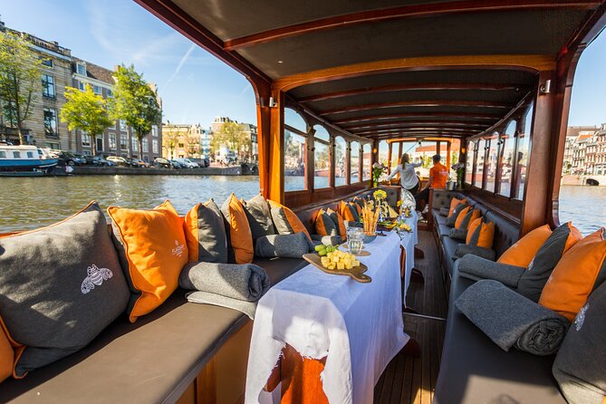 Amsterdam Historic Tour On Classic Saloon Boat - The Cruise Route: Skinny Bridge, Churches, and the Amstel Origin Story