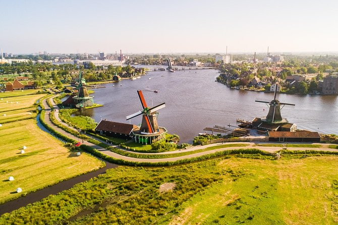 Amsterdam: Keukenhof, Zaanse Schans & Volendam Tour - Zaanse Schans: windmills, a historic shipyard vibe, and clog-making craft