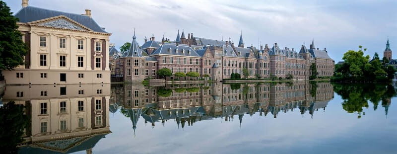 Amsterdam: Kinderdijk, Euromast, Delft and Den Haag Day Tour - Delft on foot: canals, gables, and a calmer pace than Amsterdam