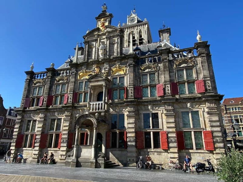 Amsterdam: Kinderdijk, Euromast, Delft and Den Haag Day Tour - Price and value for an 8.5-hour Holland sampler