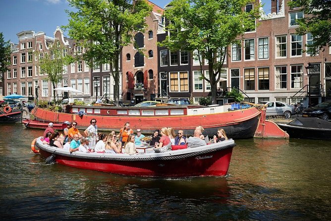 Amsterdam Light Festival: Saloon Boat Cruise + Hot Drinks & Bite - Canal-ring magic: why a night cruise makes sense