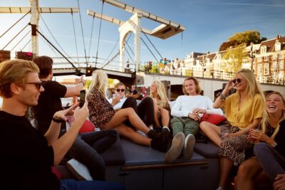 Amsterdam Light Festival: Saloon Boat Cruise + Hot Drinks & Bite - Boarding at the National Maritime Museum: timing and comfort basics