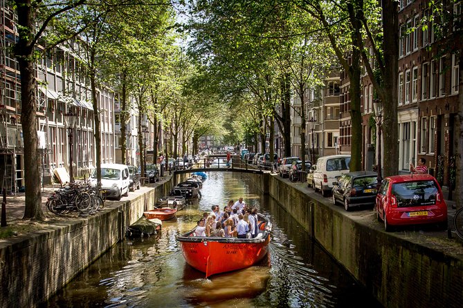 Amsterdam Light Festival: Saloon Boat Cruise + Hot Drinks & Bite - Weather, delays, and crowding: what to plan for