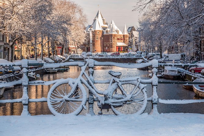 Amsterdam Light Festival Winter Walk with Stroopwafel Workshop - Flower Market and Begijnhof: One Floating, One Quiet Courtyard