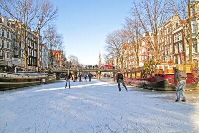 Amsterdam Light Festival Winter Walk with Stroopwafel Workshop - Royal Palace and Munttoren: City-Center Landmarks Without the Headache