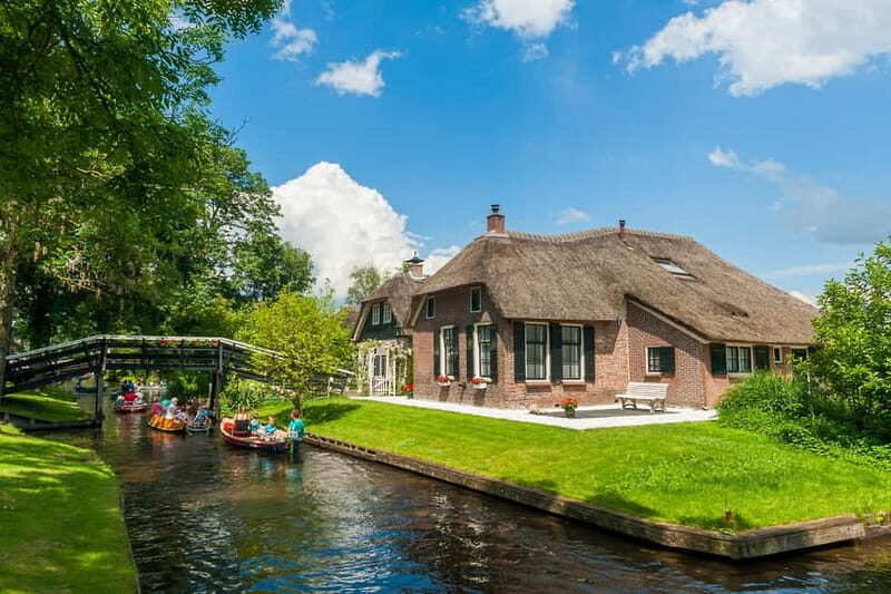 Amsterdam: Live GuideD Giethoorn Boat Tour & Cheese Platter - The Coach Ride and the Central Amsterdam Meeting Points