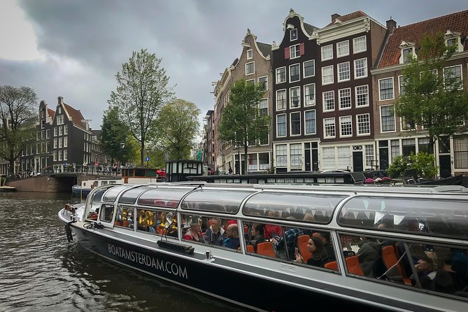 Amsterdam Live Guided Sightseeing Canal Cruise - Westertoren and Amsterdam Pipe Museum: Landmarks You Can Spot Even When You Blink
