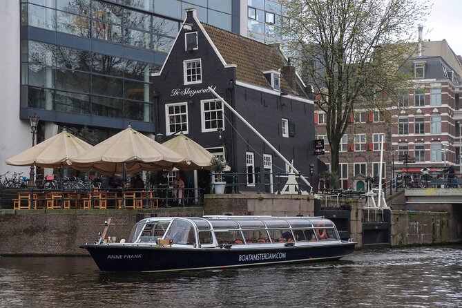Amsterdam Live Guided Sightseeing Canal Cruise - Hermitage Museum to Magere Brug: The Bridge Moment That Snaps Photos Into Focus
