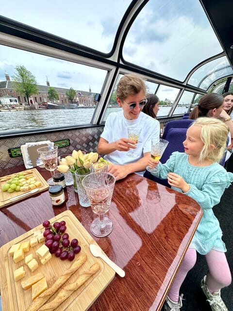 Amsterdam: Luxury Cheese & Wine Canal Cruise - Traditional Dutch Boat Ride: What the Experience Feels Like on Water