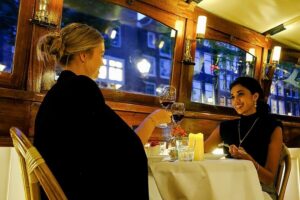 Amsterdam: Luxury Saloon Boat Cruise with 3-Course Dinner - The saloon boat setup: warm, classy, and good for photos