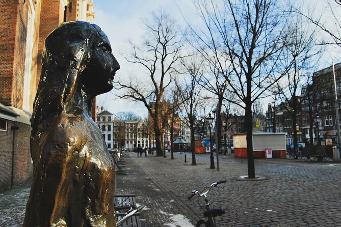 Amsterdam Must-See Historical City Walk with Local Expert - Anne Frank area and Cafe Papeneiland: passing the heavy parts, then resetting