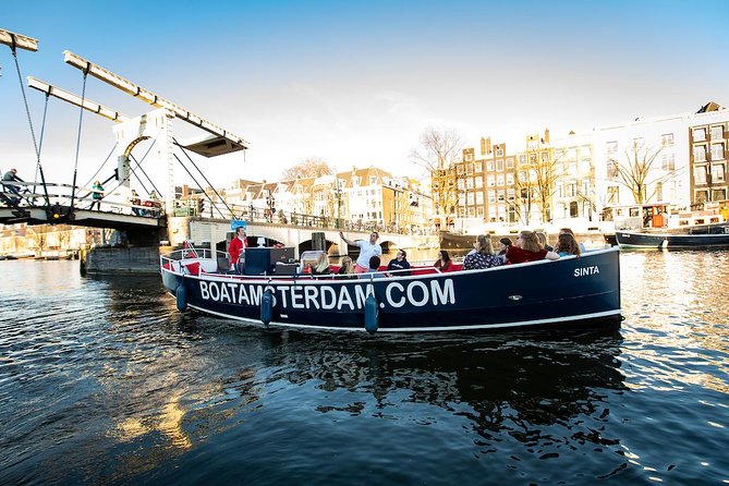 Amsterdam Open Boat Cruise in Old City Center with Live Guide - Open-Air Electric Canal Time, Without the Fuss