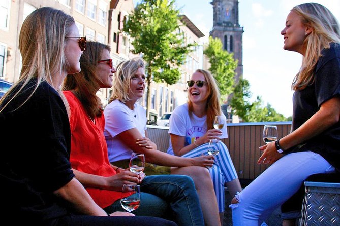Amsterdam Open Boat Sightseeing Canal Cruise - Rijksmuseum and Amsterdam Centraal: Seeing Big Architecture at Boat Level
