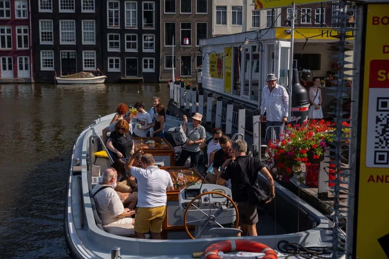 Amsterdam: Open Boat Tour of Canals with Expert Local Guide - Key highlights that make this canal cruise worth your time