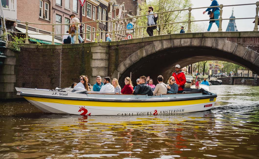 Amsterdam: Open Boat Tour of Canals with Expert Local Guide - Comfort, timing, and the little things that help