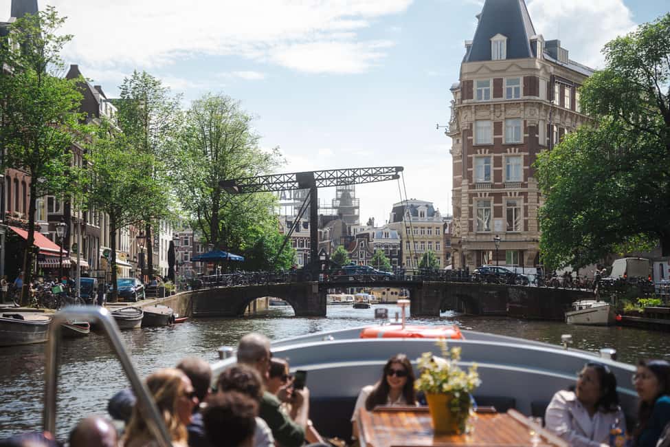 Amsterdam: Open Boat Tour of Canals with Expert Local Guide - Who this tour suits best (and who should think twice)
