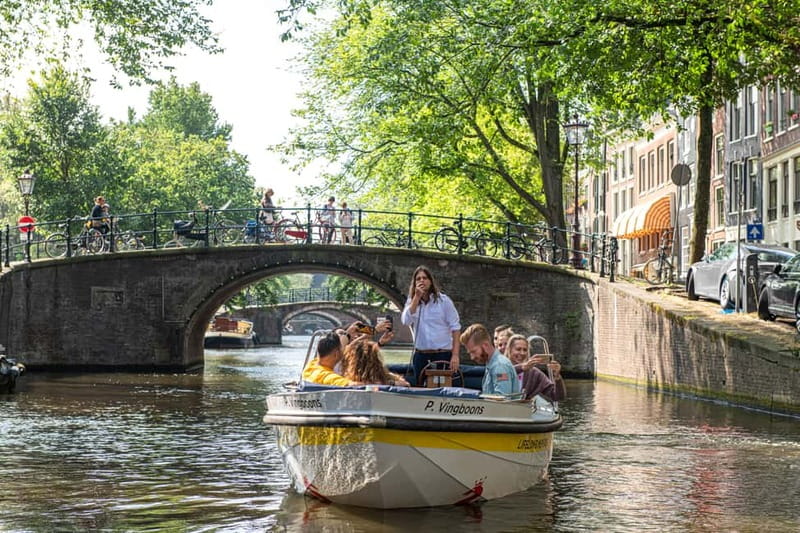 Amsterdam: Open Boat Tour of Canals with Expert Local Guide - Picking your departure point: Damrak, Rijksmuseum, or Prins Hendrikkade