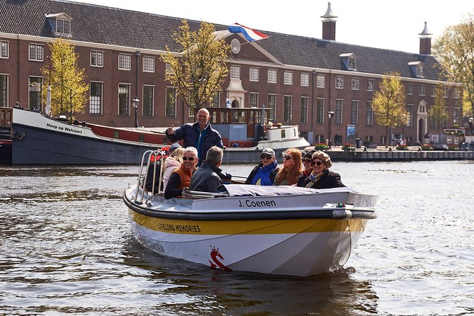 Amsterdam Open Boat Tour with Local Guide - Floating Through Amsterdam in One Hour