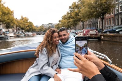 Amsterdam Open Boat Tour with Local Guide - Captain-Led Narration Beats Headphones