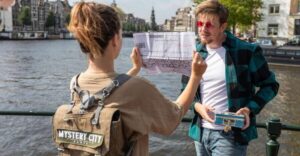 Amsterdam: "Operation 45 " Treasure Hunt Walking Tour - Meeting Mystery City Games: your HQ and the backpack game kit