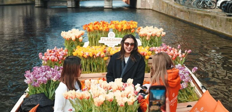 Amsterdam: Premium Tulip Boat Canal Tour - The tulip boat setup: lifelike flowers and better photos